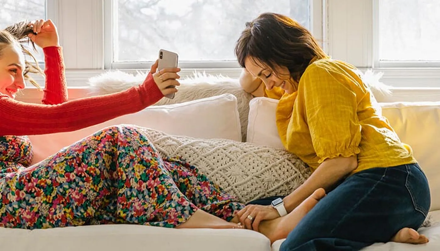 Family using digital devices at home
